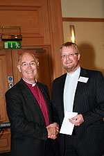 Rev Michael Parker accepts his prize in the Communications Competition