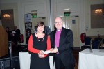 Ms Lynn Glanville, Dublin DCO, accepts a prize from the Archbishop